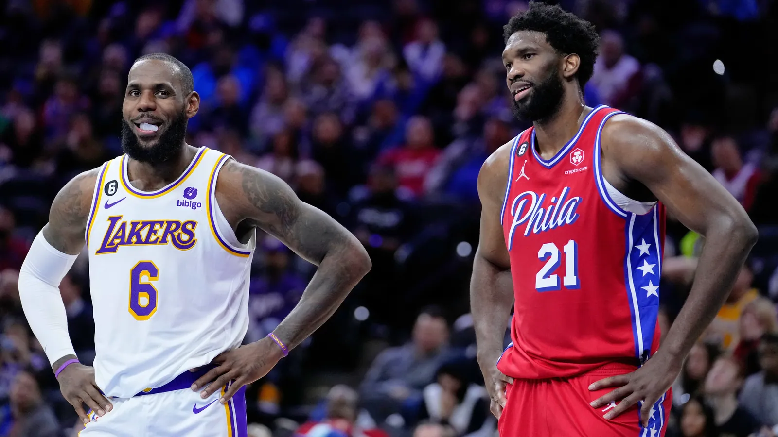 Los Angeles Lakers' LeBron James and Philadelphia 76ers' Joel Embiid play during an NBA basketball game, Friday, Dec. 9, 2022, in Philadelphia.