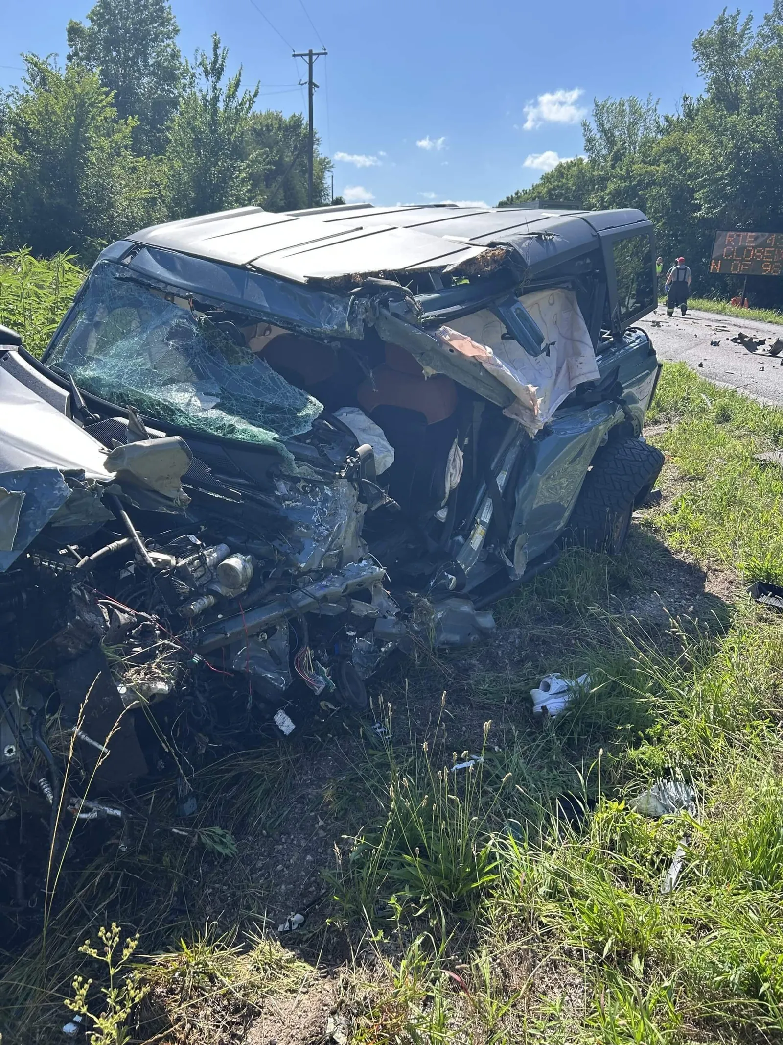 A photo shows the damage to the SUV driven by ESPN's Matt Miller following a highway collision in June.