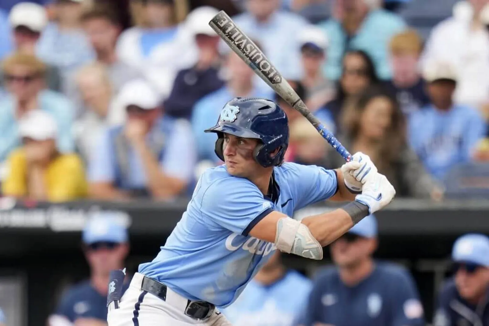 UNC shortstop Jake Schaffner holds the bat and looks toward the mound as he prepares to swing during an NCAA baseball game.